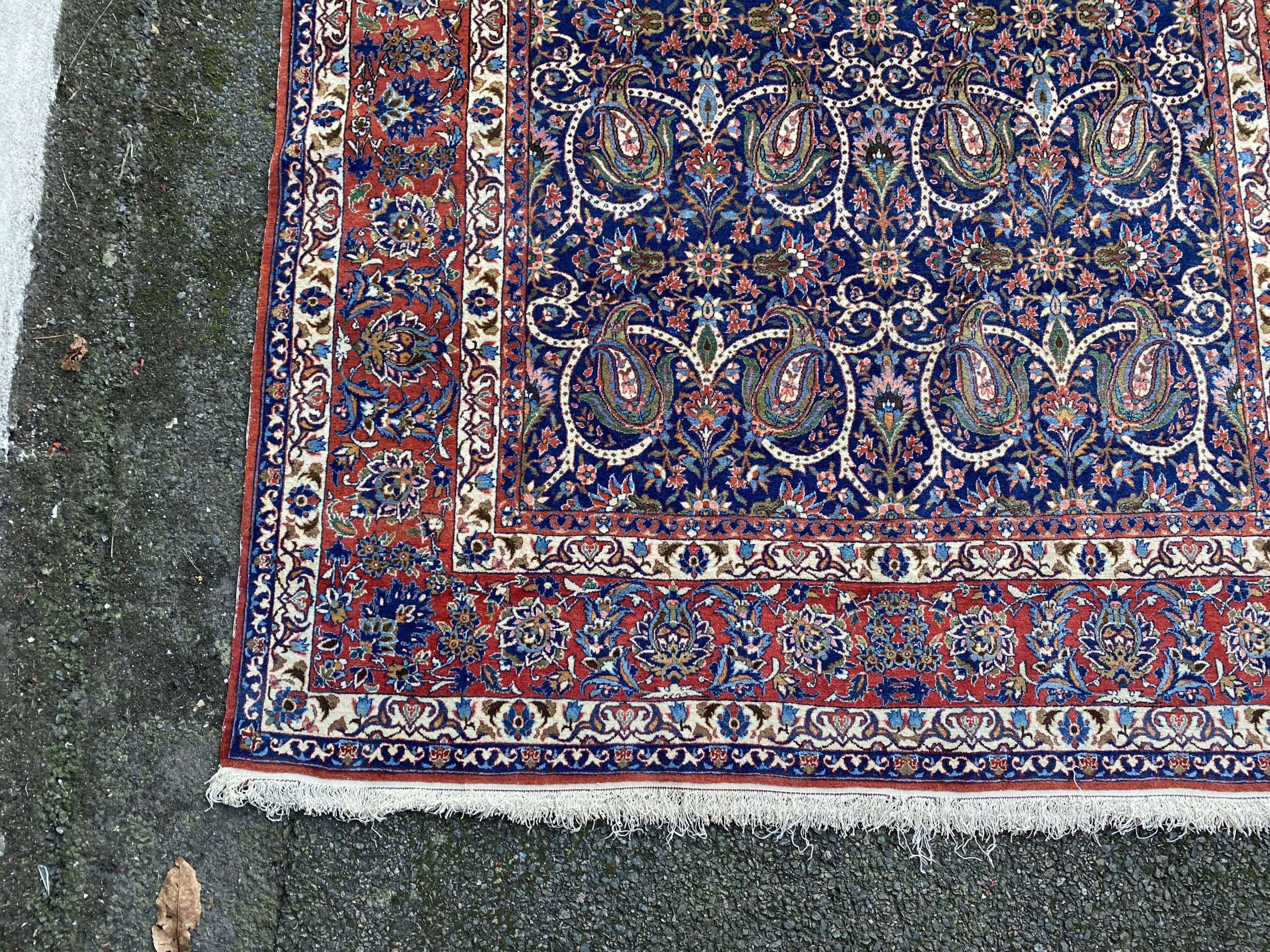 A Tabriz blue ground rug, first half 20th century, 225 cm x 155 cm